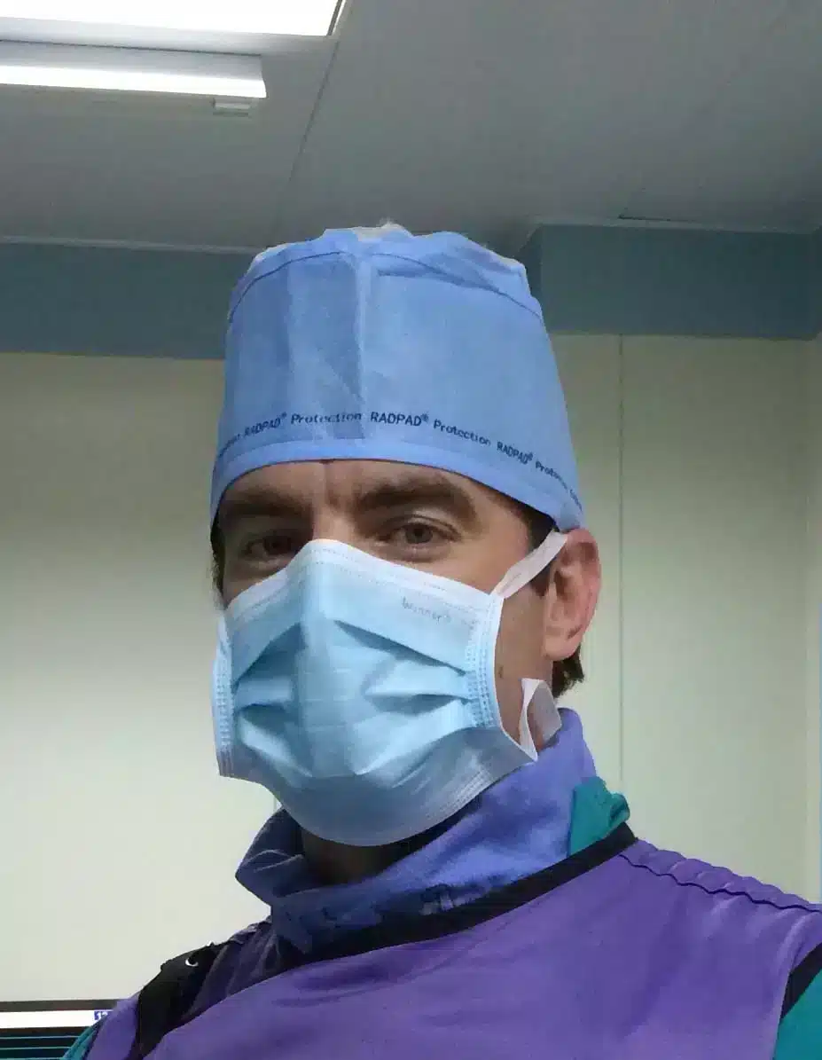 RADPAD® No Brainer® cap worn by physician.