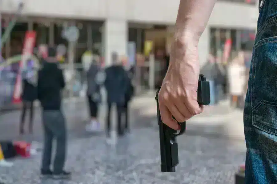 holding pistol